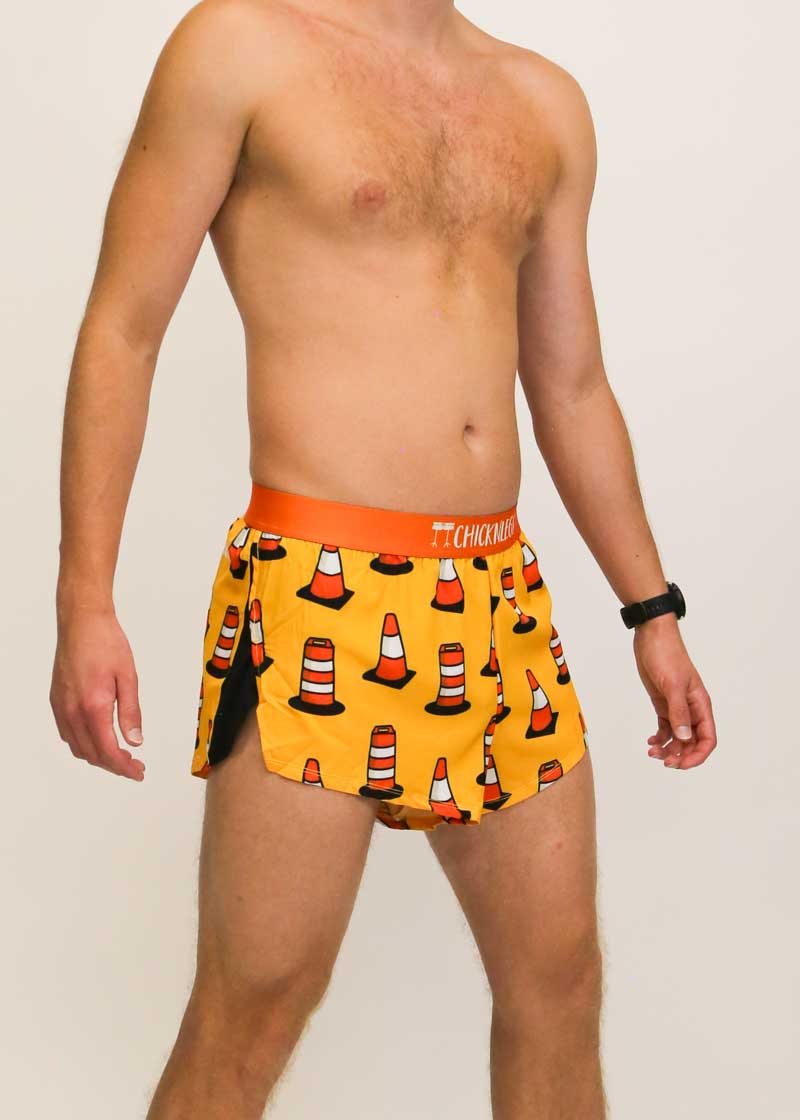 Side view of the ChicknLegs traffic cone running shorts.