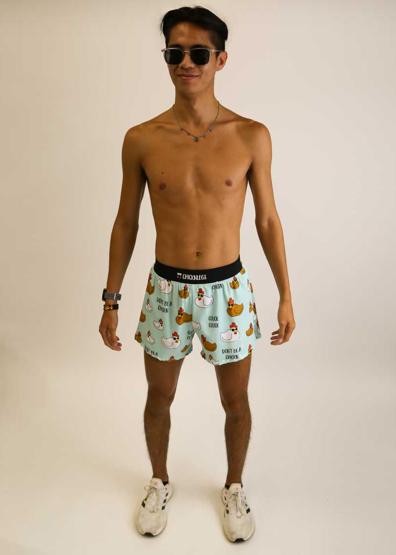 Runner wearing ChicknLegs swaggy chickens running shorts with shades on.