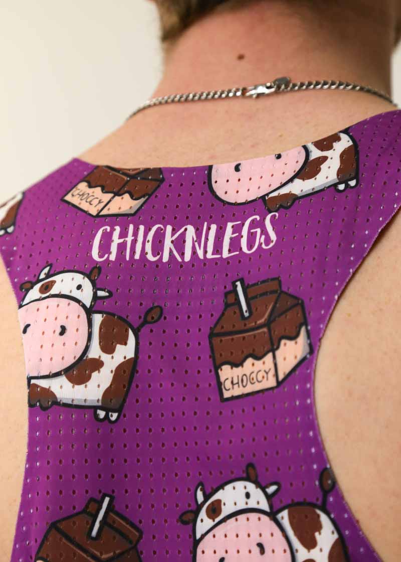 Closeup view of the back of the men's choccy cows performance singlet with mesh paneling.