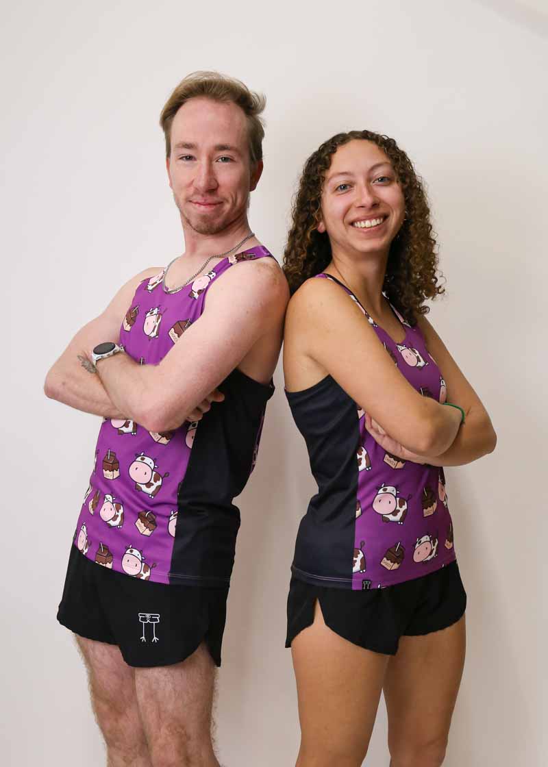 Runners back to back wearing the matching choccy cows running singlets.
