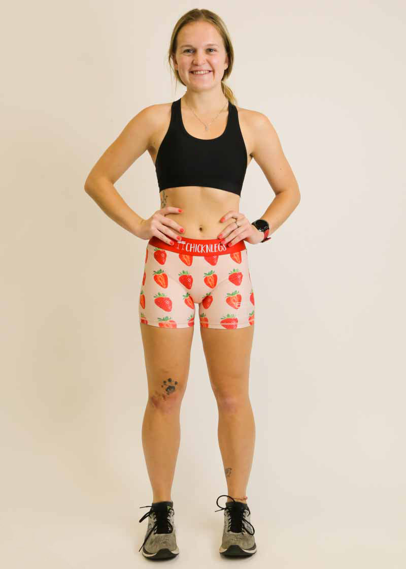 Full body view of the women's 3 inch strawberry compression running shorts from ChicknLegs.