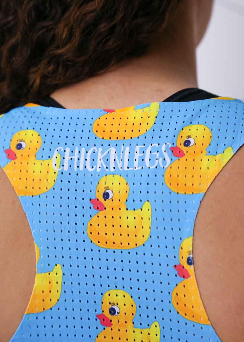 Closeup view of the back perforated mesh of the women's rubber ducky performance singlet from ChicknLegs.