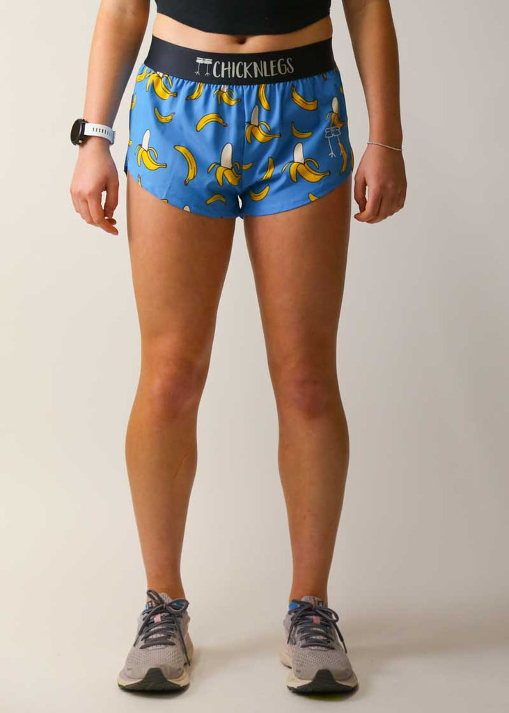 Front view of the women's blue bananas split running shorts from ChicknLegs.