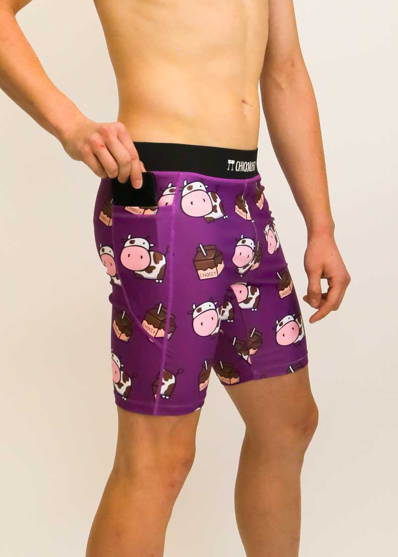 Side view of the ChicknLegs running half tights with a choccy cows design.