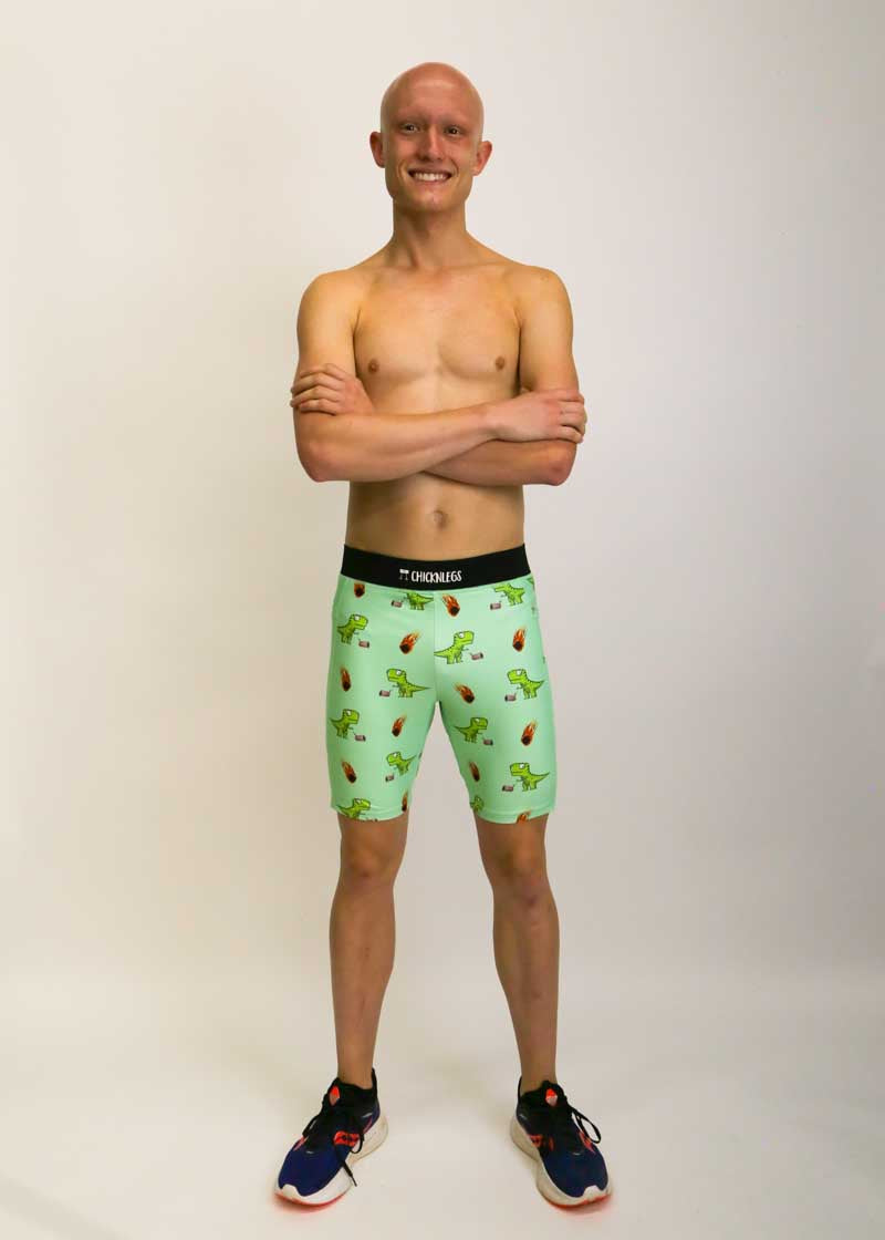 Runner wearing the men's 8 inch dinosaur half tights from ChicknLegs.
