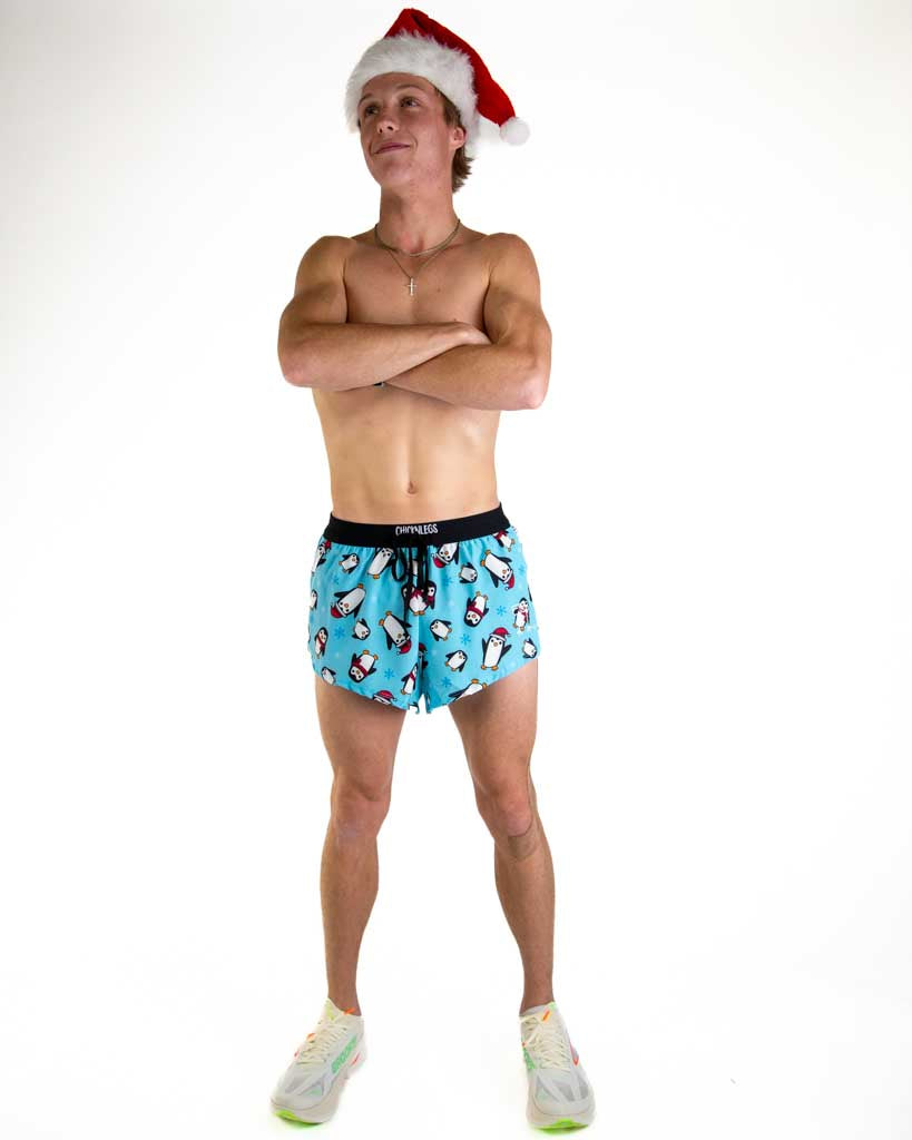 Full body view of model wearing ChicknLegs Men’s 2-inch DS Split Running Shorts featuring a soft elastic drawstring waistband, inner pocket, and black mesh liner for full coverage and breathability.