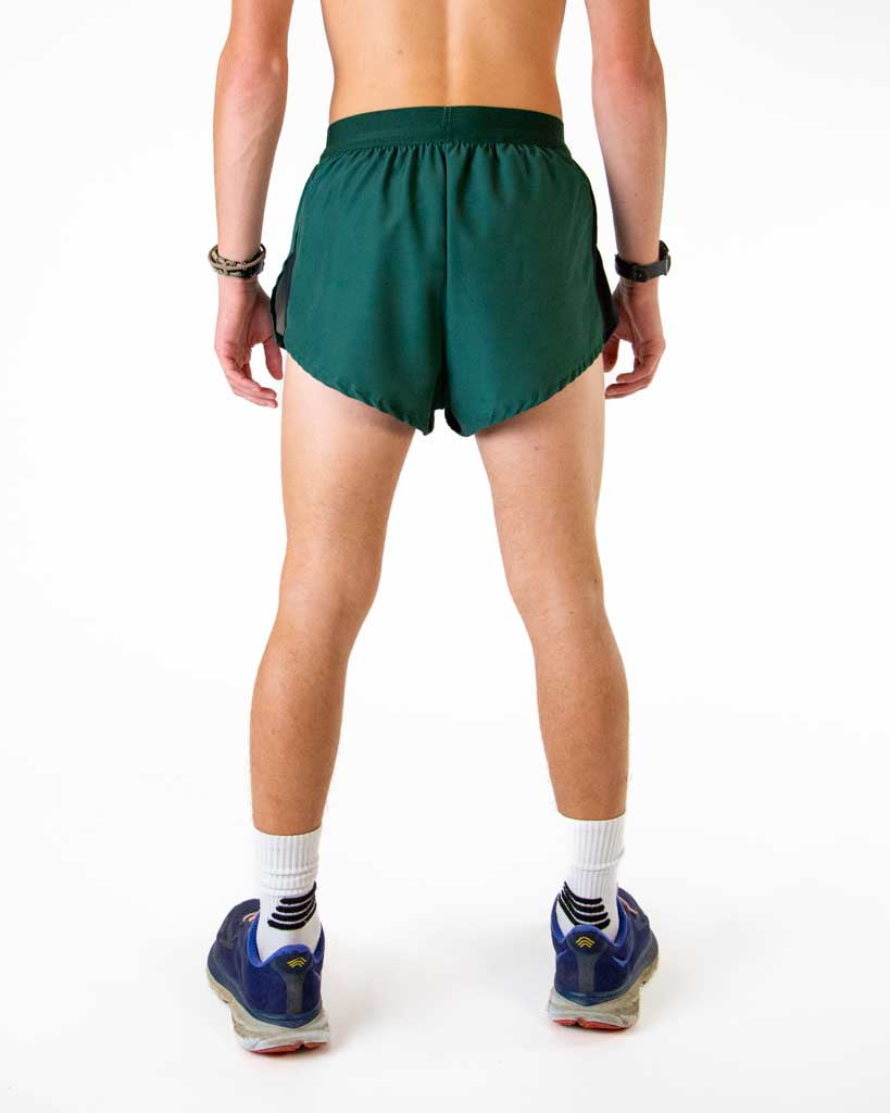Back view of ChicknLegs men’s 2-inch split running shorts in forest green pattern, showing elastic waistband and breathable liner.