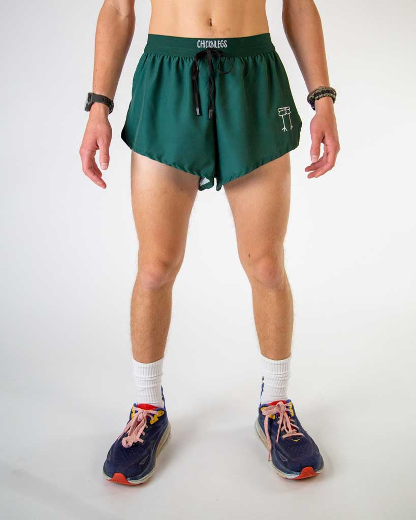 Front view of ChicknLegs men’s 2-inch split running shorts with drawstring, breathable liner, solid forest green design.