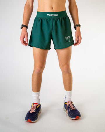 Front view of ChicknLegs men’s 4-inch split running shorts, breathable liner, solid forest green design.