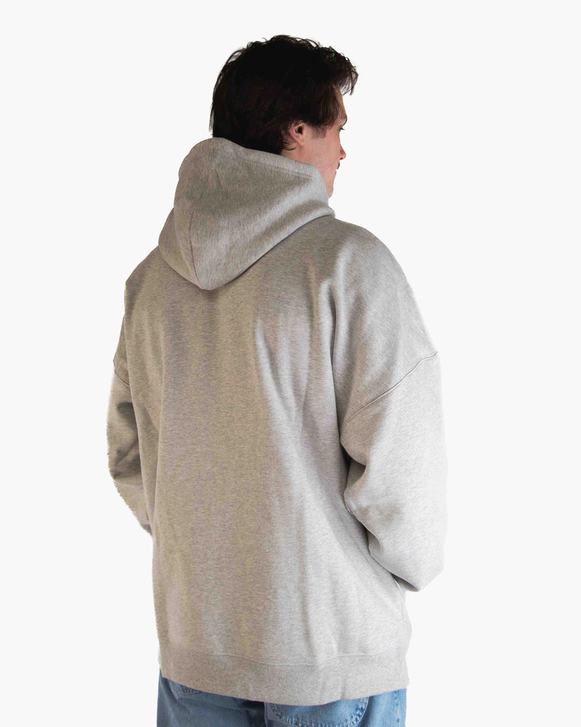 Back view of ChicknLegs Varsity Oversized Unisex Hoodie showcasing the loose unisex fit and midweight fabric suitable for everyday wear.
