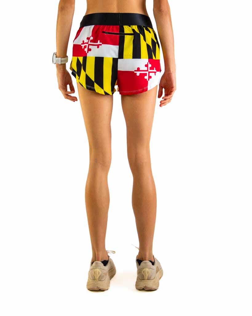 Back view of ChicknLegs Women’s 1.5-inch split running shorts showcasing the rear zipper pocket for essentials and elastic waistband that provides a comfortable, stay-put fit.