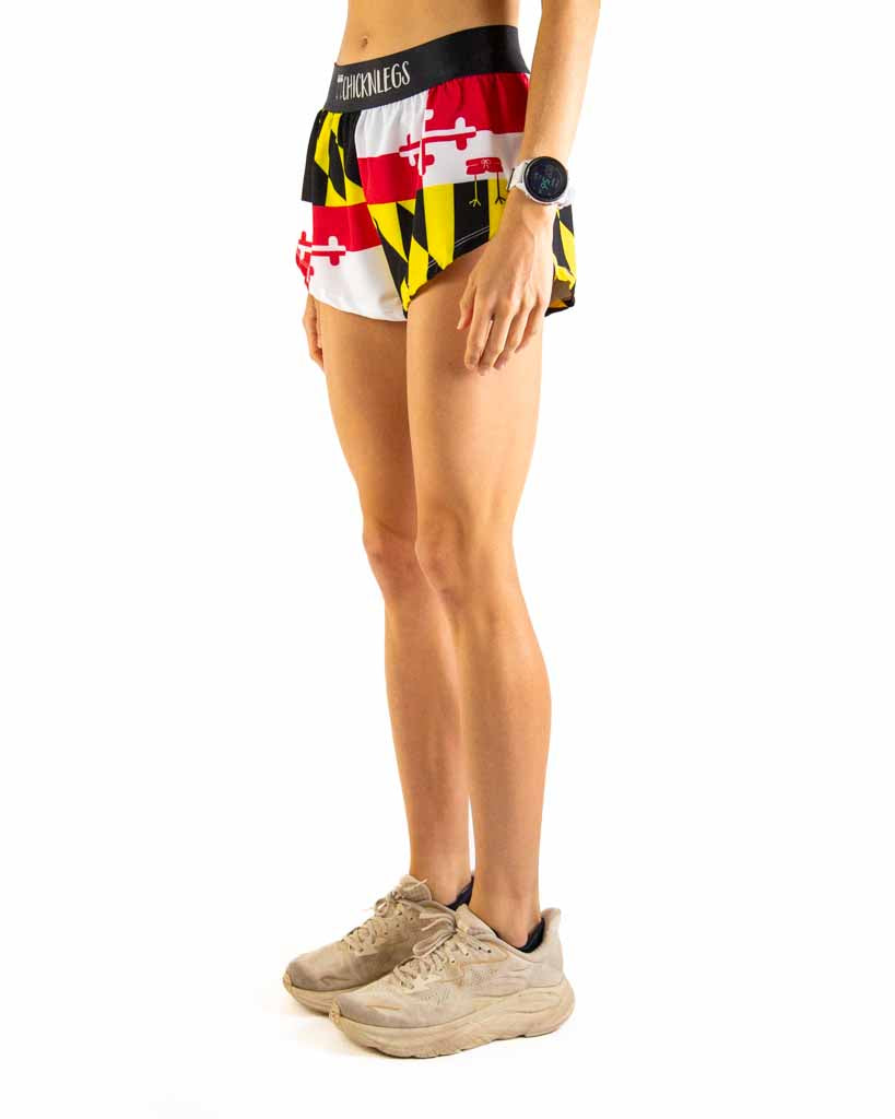 Left side view of ChicknLegs Women’s 1.5-inch split running shorts.