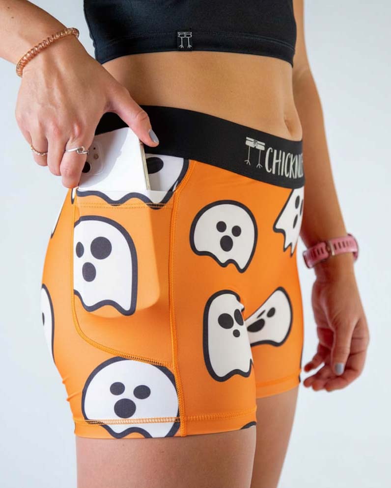 Runner is wearing ChicknLegs in the women's 3 inch compression shorts in the Ghost design. 