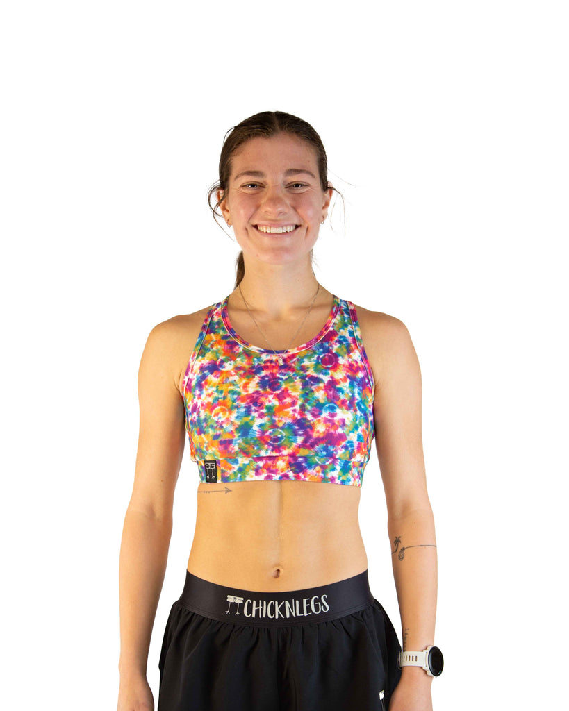 Front view of ChicknLegs Women’s OG Sports Bra in the tie-dye look! Featuring lightweight fabric perfect for training and racing, with a sleek, supportive fit.