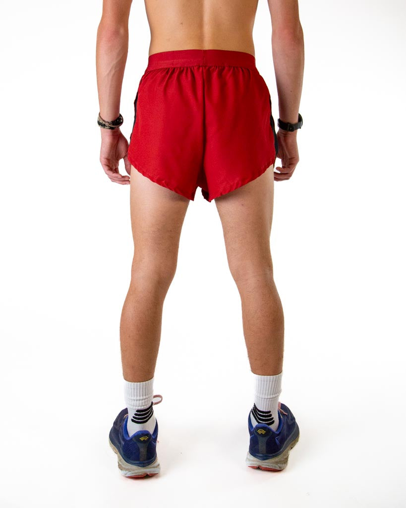 Back view of ChicknLegs men’s 2-inch split running shorts in solid cardinal red, showing elastic waistband and breathable liner.