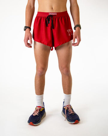 Front view of ChicknLegs men’s 2-inch split running shorts with drawstring, breathable liner, in solid cardinal red.