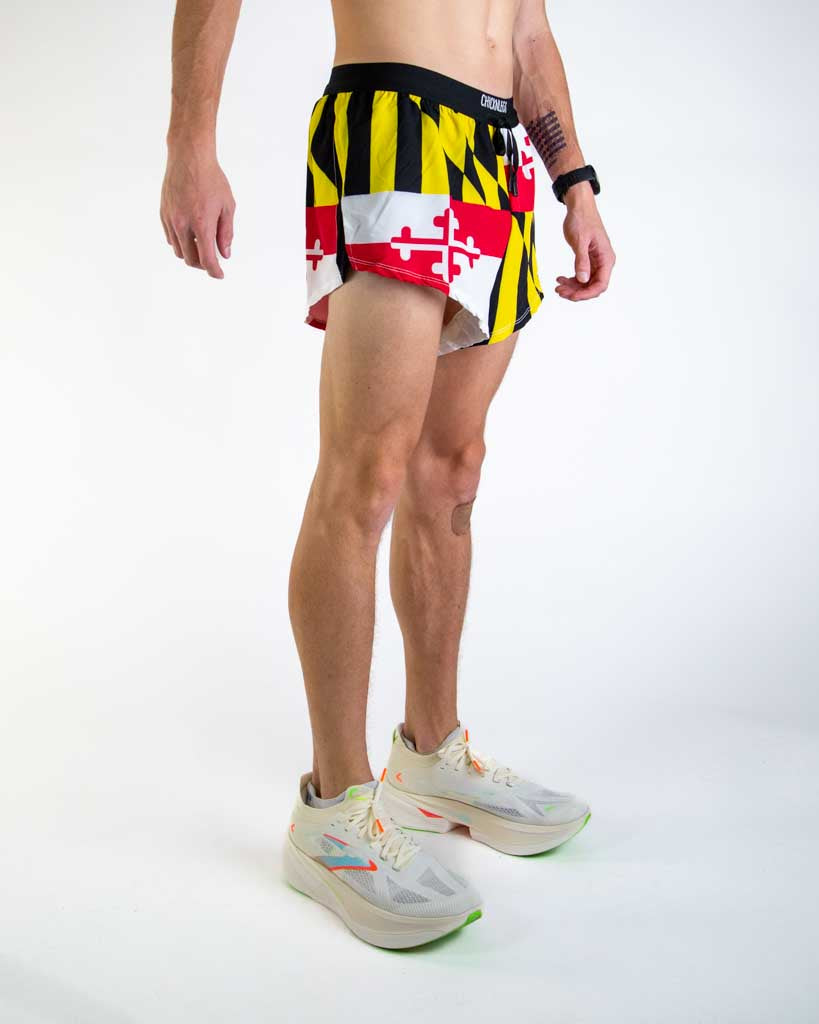 Right side view of ChicknLegs Men’s 2-inch DS Split Running Shorts highlighting the soft elastic drawstring waistband, breathable black mesh liner, and inner pocket for essentials.