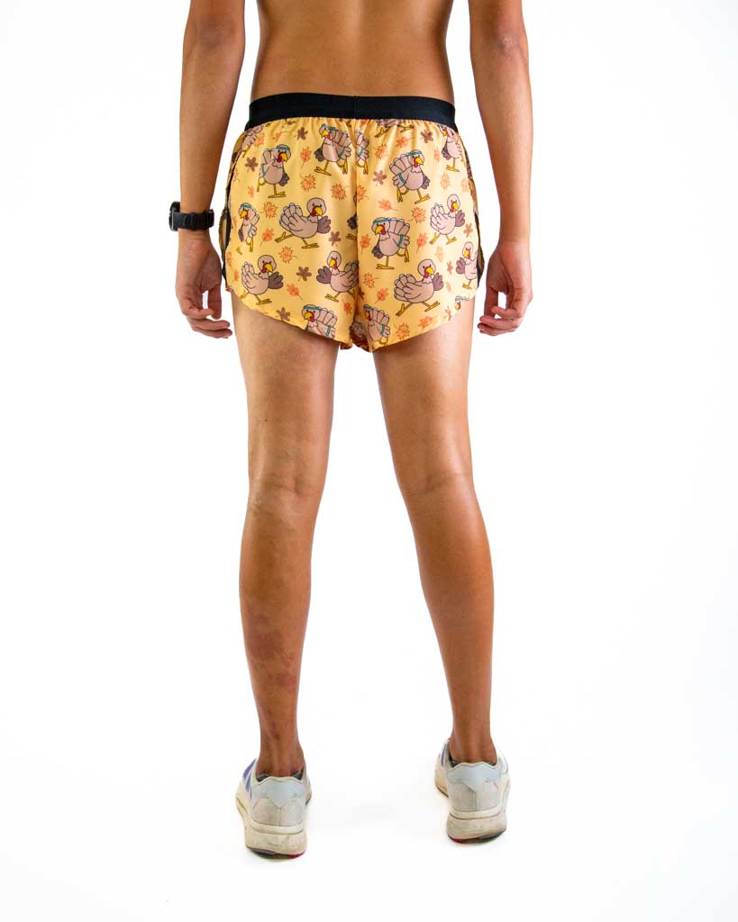 Back view of ChicknLegs men’s 2-inch split running shorts in thanksgiving turkey pattern, showing elastic waistband.