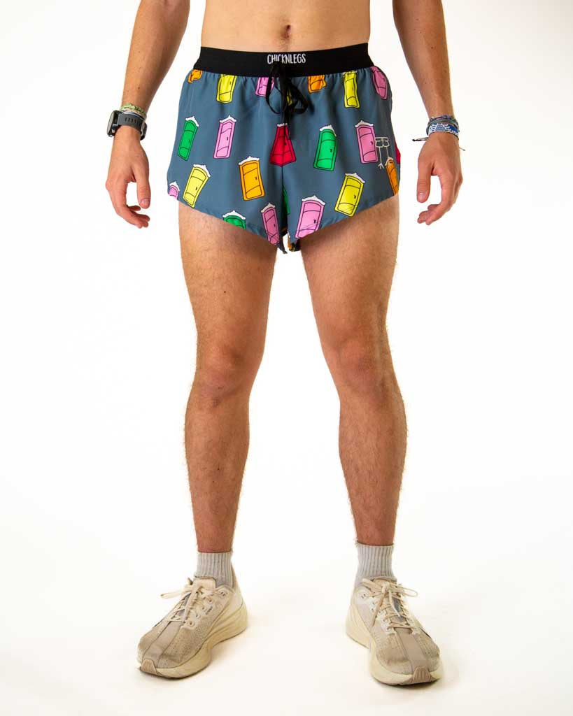 Front view of ChicknLegs men’s 2-inch split running shorts with drawstring, breathable liner, blue background and porta potty design.