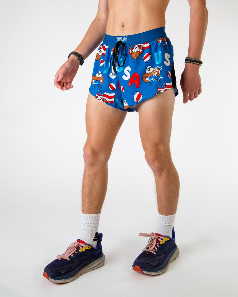 Left side view of ChicknLegs men’s 2-inch split running shorts in blue background and eagles with swimming trunks design, featuring split leg design for running.