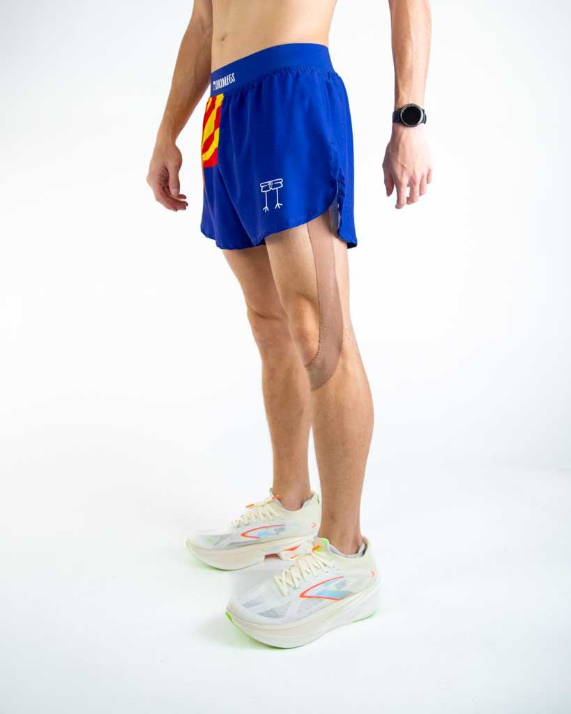 Left side view of ChicknLegs men’s 4-inch split running shorts showing the lightweight design, split leg for mobility, and smooth waistband that stays in place.