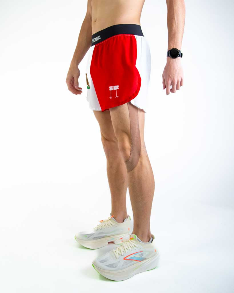 Left side view of ChicknLegs men’s 4-inch split running shorts showing the lightweight design, split leg for mobility, and smooth waistband that stays in place.
