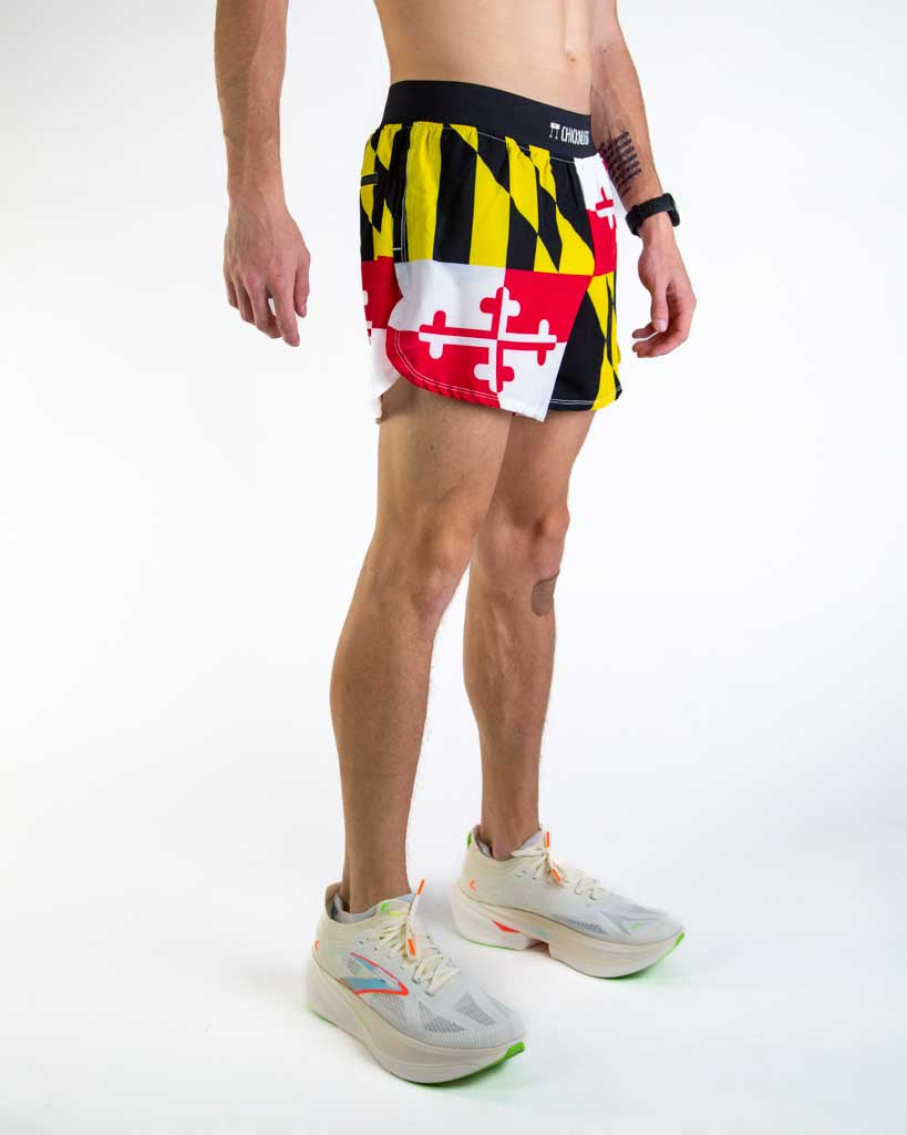 Right side view of ChicknLegs men’s 4-inch split running shorts with soft elastic waistband and breathable black mesh liner visible through the split leg detail.