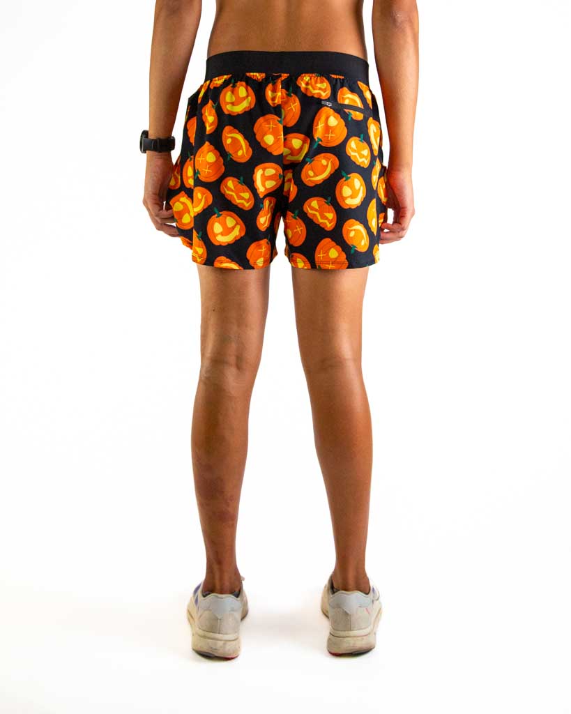 Back view of ChicknLegs men’s 4-inch split running shorts highlighting the rear zipper pocket for essentials and elastic waistband for a secure fit.