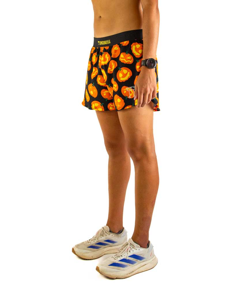Left side view of ChicknLegs men’s 4-inch split running shorts showing the lightweight design, split leg for mobility, and smooth waistband that stays in place.