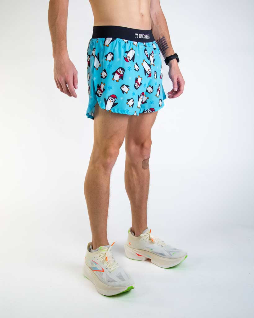 Right side view of ChicknLegs men’s 4-inch split running shorts highlighting the soft elastic waistband, 4-inch inseam, and breathable black mesh liner.