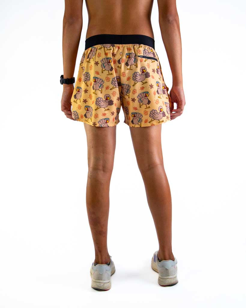 Back view of ChicknLegs men’s 4-inch split running shorts highlighting the rear zipper pocket for essentials and elastic waistband for a secure fit.