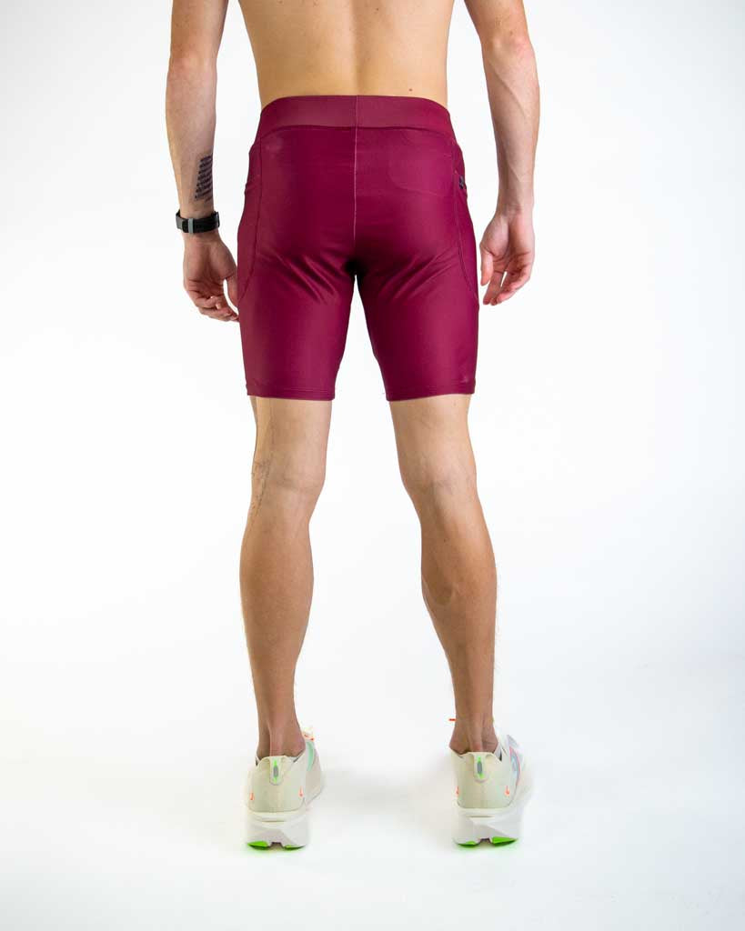 Back view of ChicknLegs Men’s 8-inch Half Tights showcasing the contoured fit, elastic waistband, and 8-inch inseam for full coverage and comfort.