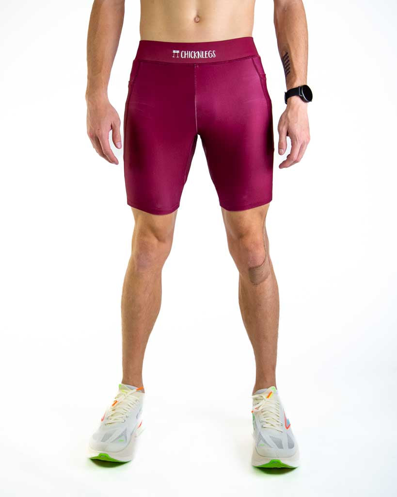 Front view of ChicknLegs Men’s 8-inch Half Tights featuring a soft elastic waistband for a smooth, secure fit and black mesh liner for support and comfort.