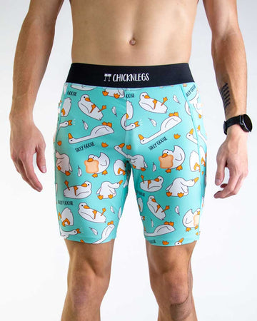 Front view of ChicknLegs Men’s 8-inch Half Tights featuring a soft elastic waistband for a smooth, secure fit and black mesh liner for support and comfort. Featured are the Silly Goose design in a light blue background with white gooses!