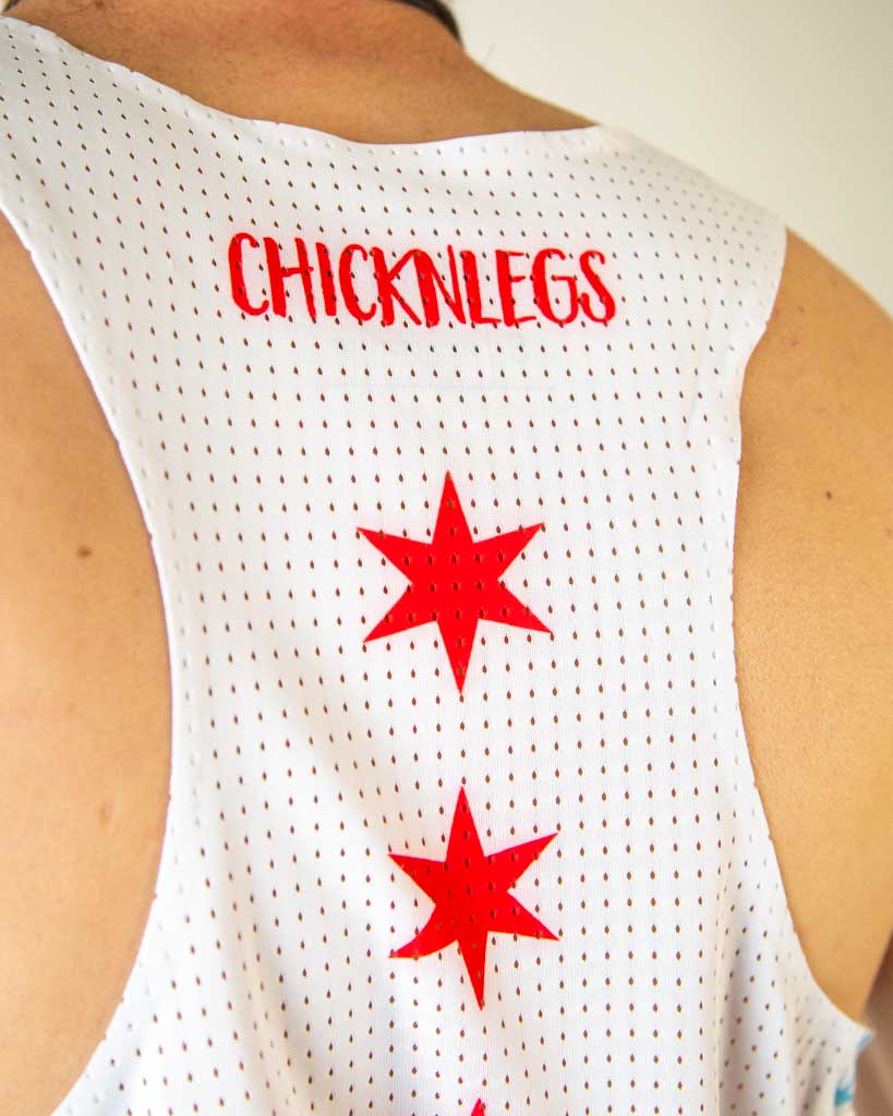 Close-up of ChicknLegs performance running singlet, lightweight fabric with the ChicknLegs Logo and Chicago Stars on the back of the Chicago Marathon design, showing the seamless back and breathable mesh.