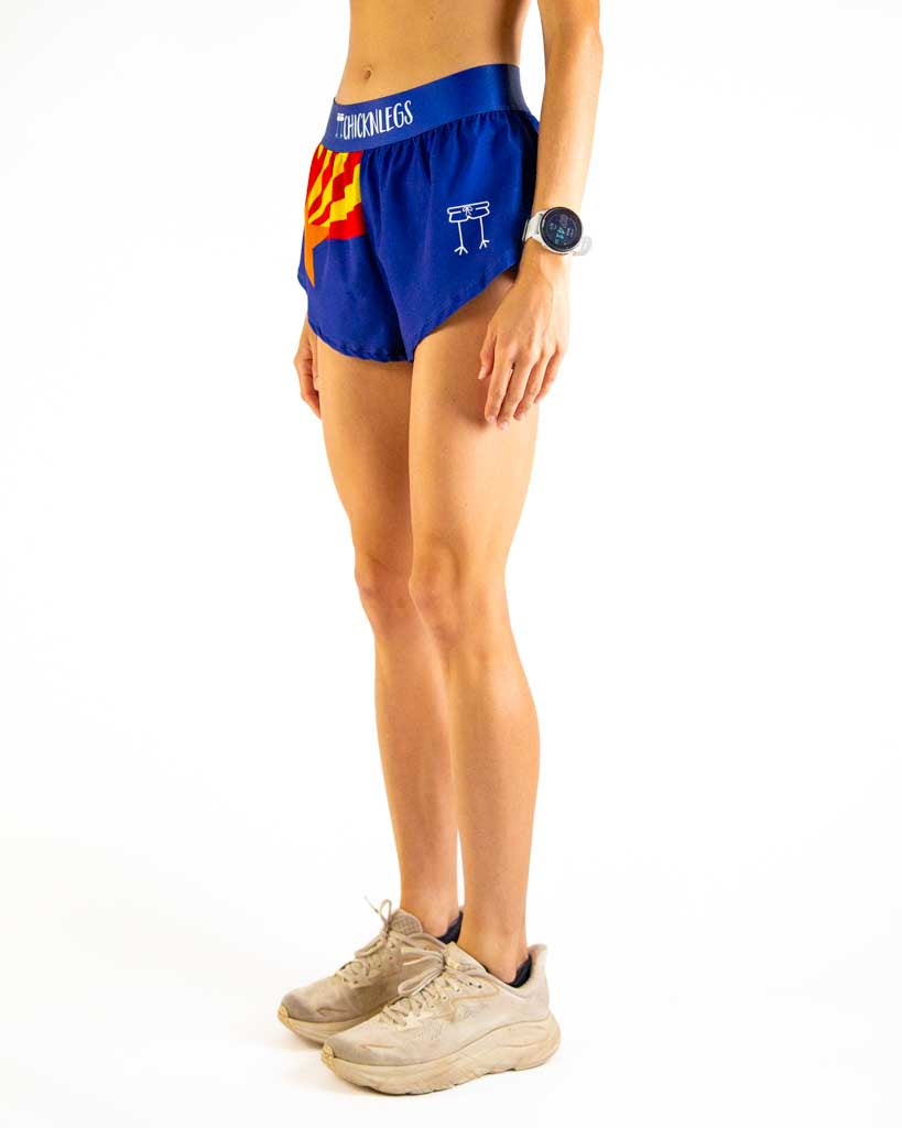 Left side view of ChicknLegs Women’s 1.5-inch split running shorts showing the split leg design for mobility, lightweight fabric, and smooth waistband that stays in place.