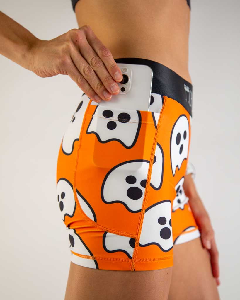 Close-up detail of ChicknLegs Women’s 3-inch compression shorts fabric, showing the spandex-polyester blend, flat seams for comfort, and pocket stitching details.