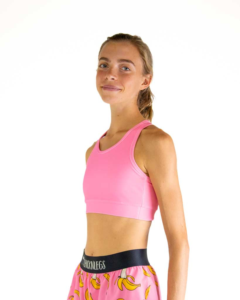 Right side view of ChicknLegs Women’s OG Sports Bra highlighting the pad-accessible design and seamless construction for comfort during runs.