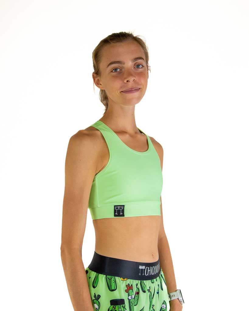 Right side view of ChicknLegs Women’s OG Sports Bra highlighting the Pickle Juice design and seamless construction for comfort during runs.
