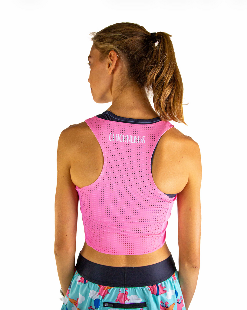 Back view of ChicknLegs Women’s PWR Crop Top showcasing the breathable mesh back panel for ventilation and comfort during runs.