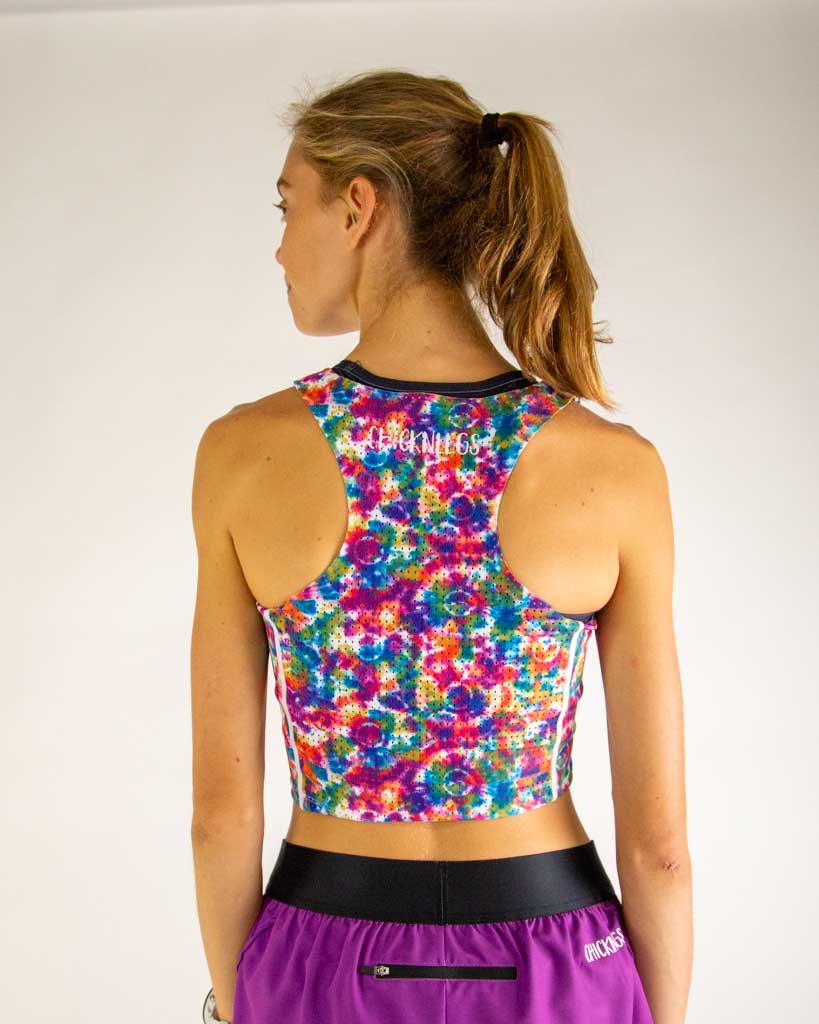 Back view of ChicknLegs Women’s PWR Crop Top showcasing the breathable mesh back panel for ventilation and comfort during runs.