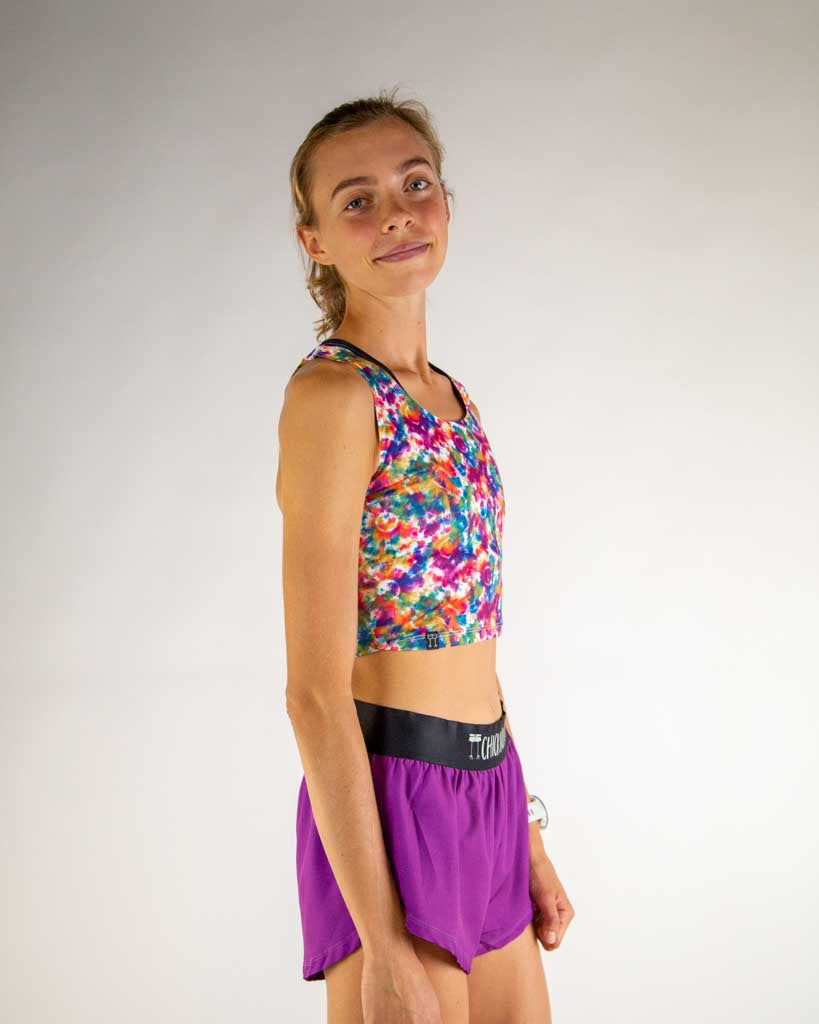 Right side view of ChicknLegs Women’s PWR Crop Top highlighting the cropped length and seamless neckline with lightweight, breathable fabric ideal for racing and training.