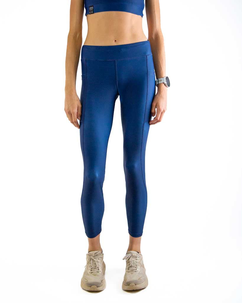 Front view of ChicknLegs Women’s Navy Leggings designed for running, featuring a mid-rise 26-inch length, buttery-soft performance fabric, and adjustable internal drawstring for a secure fit.
