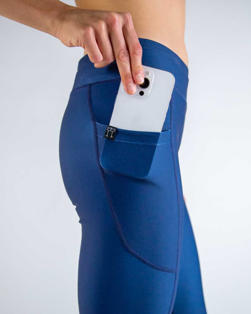 Close-up detail of ChicknLegs Women’s Navy Leggings fabric and construction, featuring buttery-soft performance material, flat seams for comfort, and pocket stitching detail.