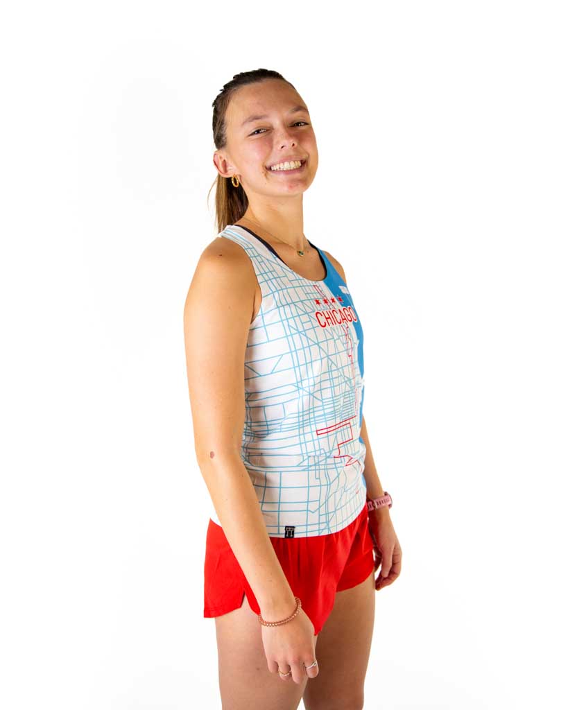 Runner is wearing ChicknLegs in the women's performance running singlet in the Chicago Marathon map course route design for the Chicago Marathon. Right side view is shown, showing the hemtag.
