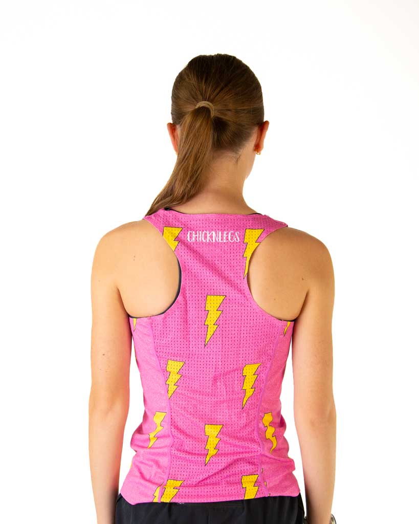 Back view of ChicknLegs women's performance running singlet showing the breathable mesh back panel and lightweight hot pink fabric with bolt pattern design.