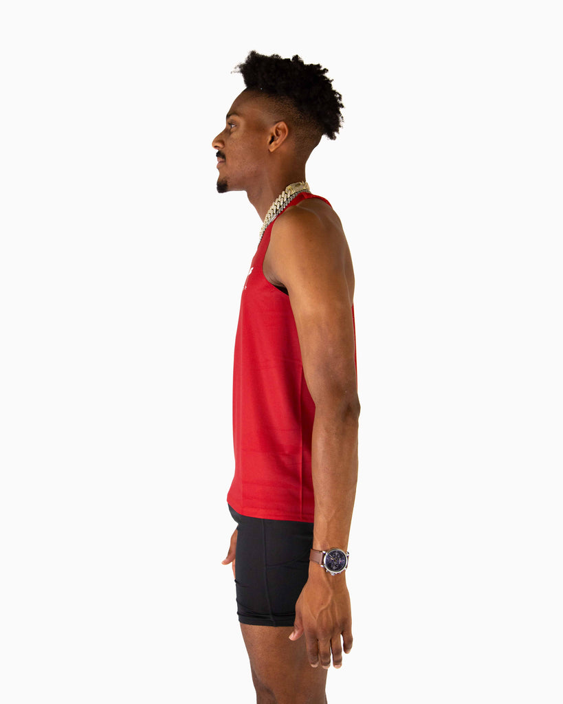 Left side view of ChicknLegs Performance Running Singlet highlighting the smooth, chafe-free seams and lightweight material for optimal movement.