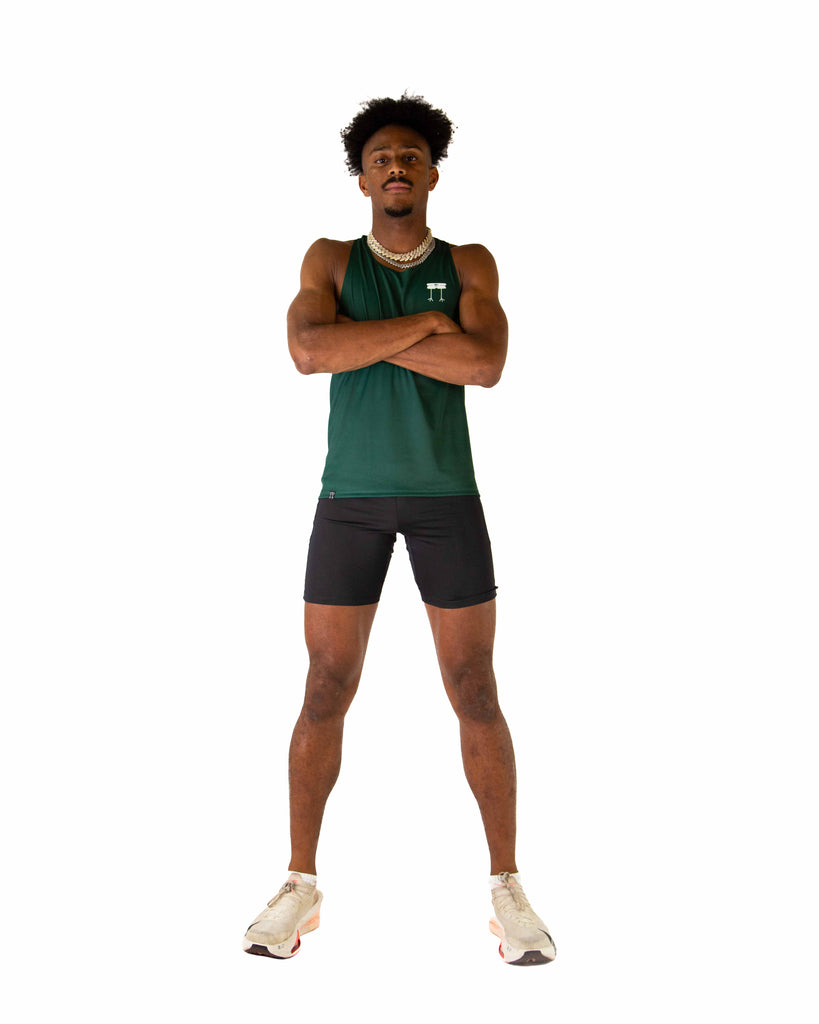 Full body view of model wearing the ChicknLegs Performance Running Singlet, featuring lightweight, breathable construction with mesh back panel and seamless armholes for a comfortable fit.