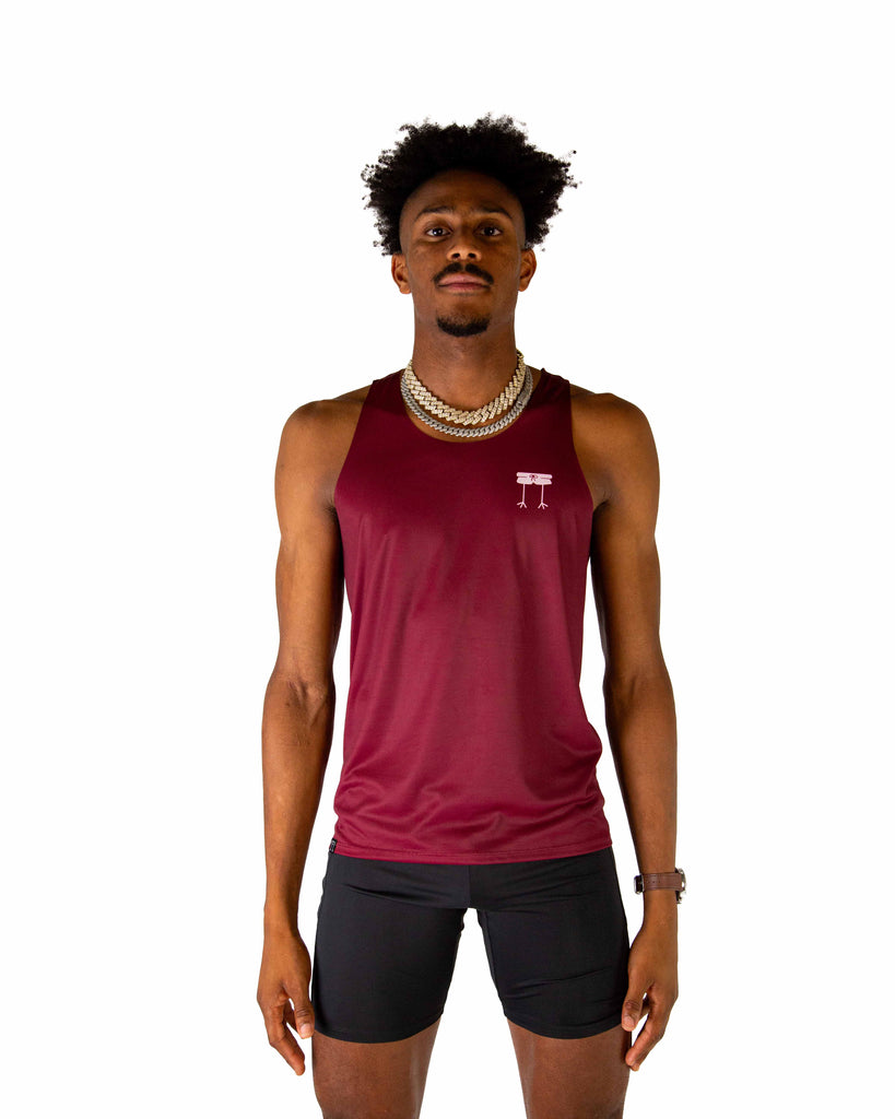 Front view of ChicknLegs Performance Running Singlet in the Maroon solid color made with lightweight fabric, shown in a fitted athletic cut with seamless neck and arm holes for comfort.