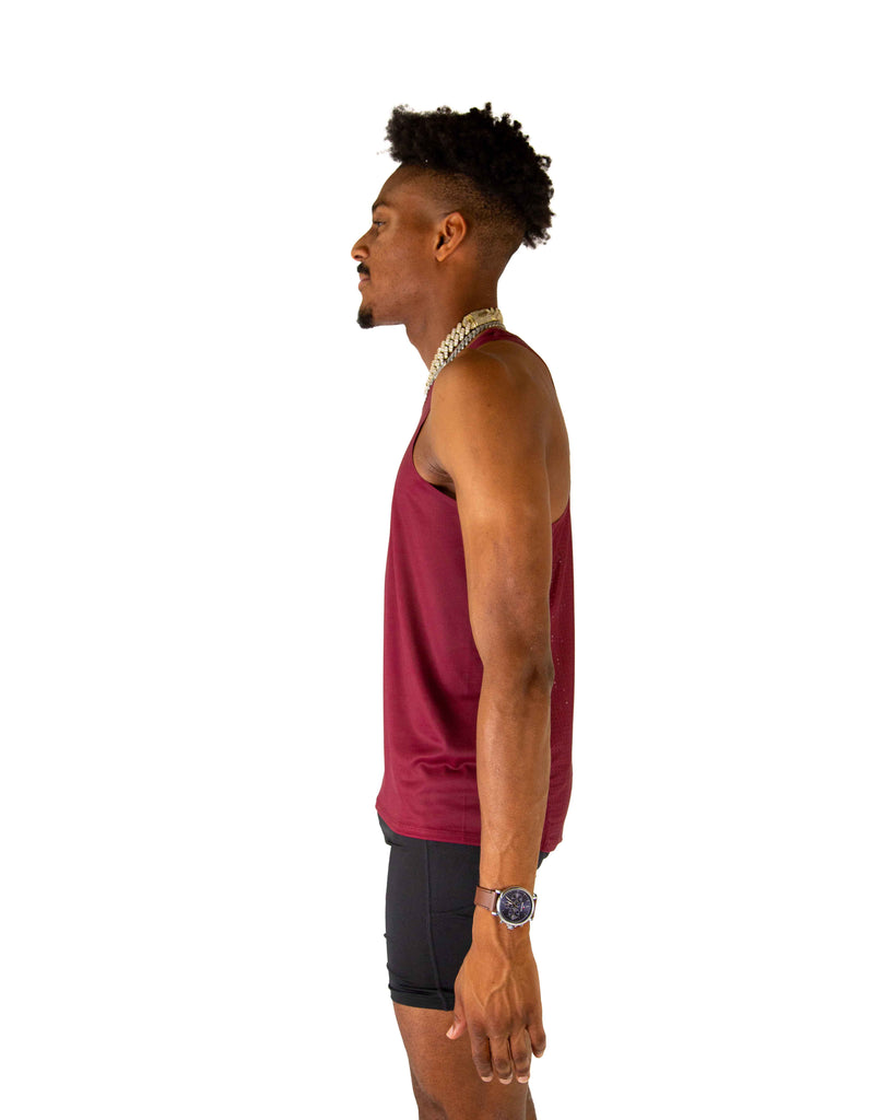 Left side view of ChicknLegs Performance Running Singlet highlighting the smooth, chafe-free seams and lightweight material for optimal movement.